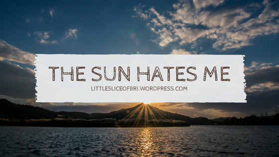 A background of a sunset with the title of the blogpost “The Sun Hates Me” blocking the sun.